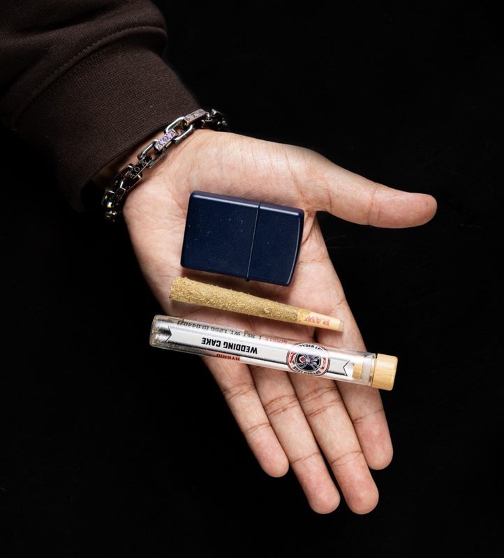 Pre-roll tube and cone in hand